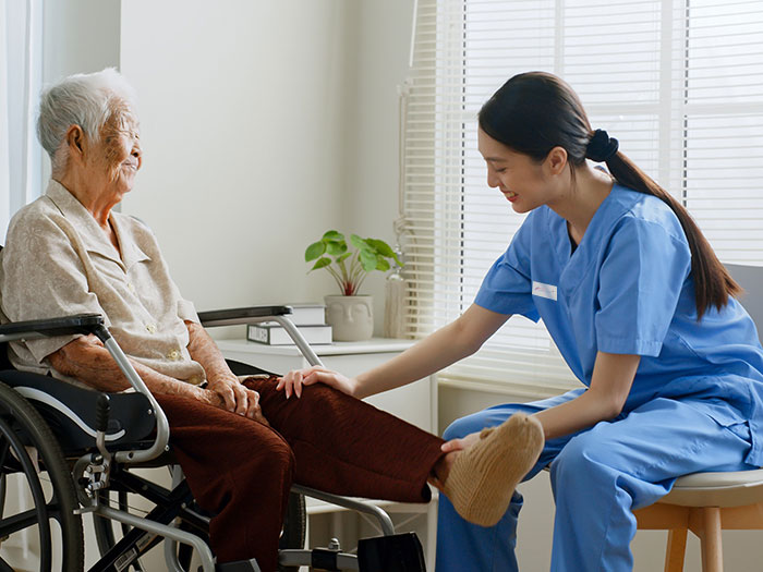 A support worker providing personal care at home