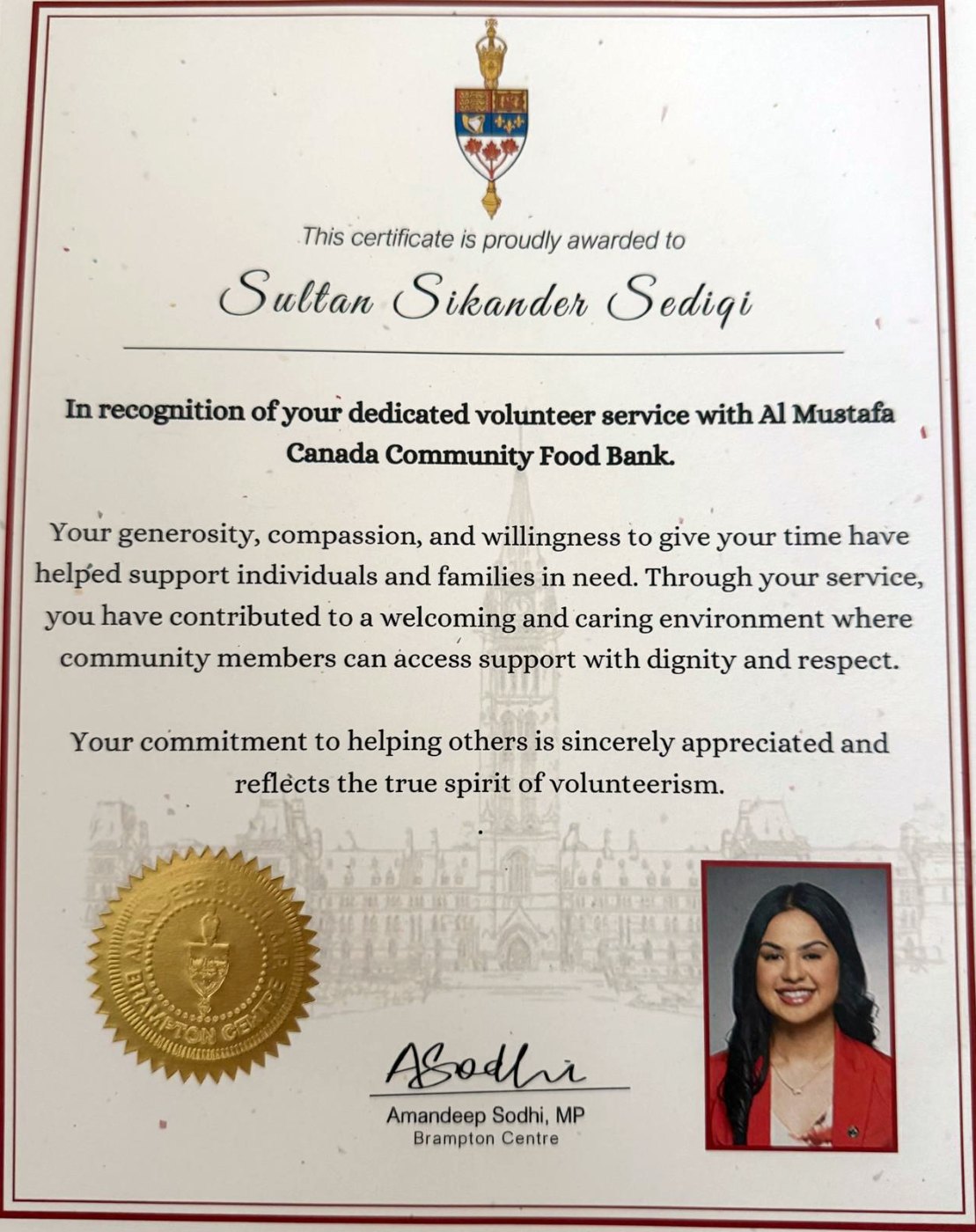 Certificate awarded to Sultan Sikander Sediqi by Amandeep Sodhi, MP for Brampton Centre, recognising volunteer service with the Al Mustafa Community Food Bank